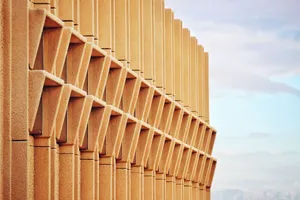 Contemporary building facade featuring sharp geometric patterns in a modern architectural design. jigsaw puzzle