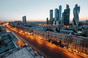 Aerial view of Moscow's skyscrapers and urban skyline during twilight, showcasing modern architecture. jigsaw puzzle