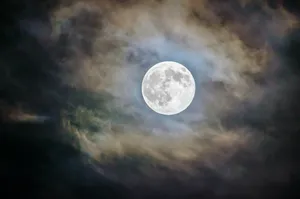 full moon and gray clouds during nighttime jigsaw puzzle