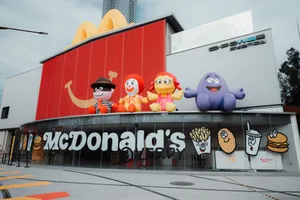 Exterior of McDonald's in Shenzhen featuring iconic character inflatables. jigsaw puzzle