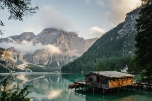 brown house near body of water jigsaw puzzle