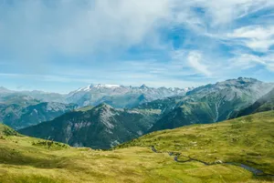 green grass field in the mountain jigsaw puzzle