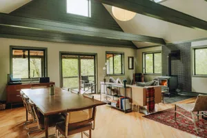Open-plan living and dining room, vaulted ceiling, wood stove jigsaw puzzle
