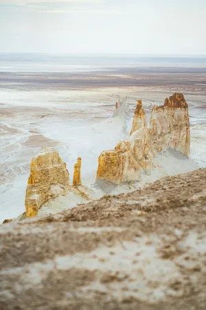 Majestic white rock formations in a vast, desolate desert. jigsaw puzzle