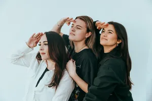 a group of women standing next to each other jigsaw puzzle