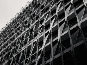 a black and white photo of a building jigsaw puzzle