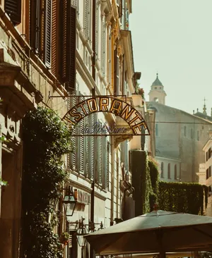 Quaint street view in Rome featuring a classic 'Ristorante' sign and historic architecture. jigsaw puzzle