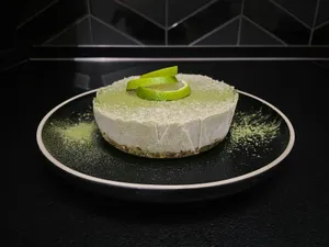 green and white cake on black ceramic plate jigsaw puzzle