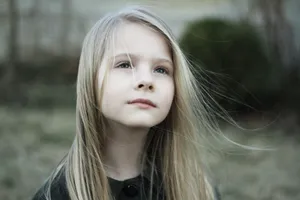 close-up photography of girl in black top during daytime jigsaw puzzle