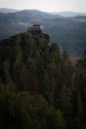 A stunning view of Jetřichovice rock formation surrounded by forest in Czech Republic. jigsaw puzzle