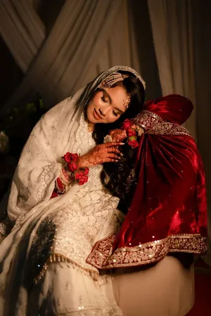 A bride in elegant Indian attire enjoying a tender moment on her special day, showcasing cultural grace and beauty. jigsaw puzzle