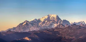Breathtaking view of Mont Blanc during a sunny day showcasing majestic snow-capped peaks. jigsaw puzzle