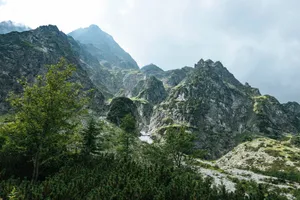 Stunning view of the Tatra Mountains under a cloudy sky, highlighting natural beauty. jigsaw puzzle