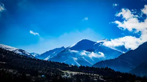 Breathtaking view of snow-covered mountains under a bright blue sky in Visso, Italy. jigsaw puzzle
