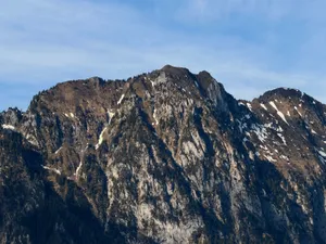 Breathtaking view of snow-capped mountains in the Swiss Alps with a clear blue sky. jigsaw puzzle