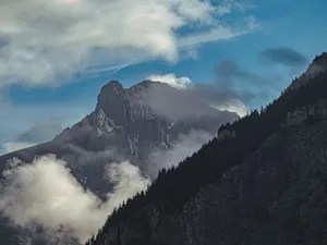 Majestic Swiss Alps with clouds and blue sky in Kandersteg, perfect for nature lovers. jigsaw puzzle