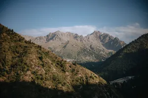 Majestic mountain landscape with clear sky and rugged peaks, perfect for nature enthusiasts. jigsaw puzzle