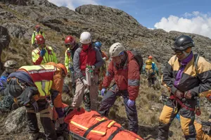 Rescue team aiding injured climber in rugged mountains of La Paz, Bolivia. Outdoor safety operation. jigsaw puzzle