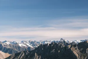 Breathtaking view of the snow-capped Dévoluy mountains under a blue sky. Perfect for nature lovers. jigsaw puzzle