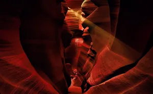 Captivating sunbeams illuminate the red sandstone in Arizona's Antelope Canyon. jigsaw puzzle