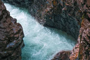 Explore the breathtaking canyon with turquoise rapids and steep rocky cliffs in Oberstdorf, Germany. jigsaw puzzle