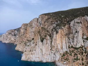 Stunning aerial view of the rugged coastal cliffs along the Mediterranean Sea in Sardinia, Italy. jigsaw puzzle