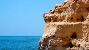A breathtaking view of limestone cliffs against the azure Atlantic Ocean in Algarve, Portugal. jigsaw puzzle
