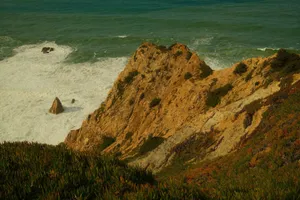 Sweeping view of rugged cliffs and ocean waves in Colares, Portugal. jigsaw puzzle