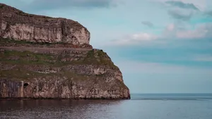 Majestic coastal cliff at Llandudno against a blue sky and sea. jigsaw puzzle