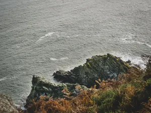 Stunning coastal view with rugged cliffs and crashing waves in County Offaly, Ireland. jigsaw puzzle