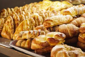 Freshly baked Mexican pastries displayed on a tray in a Puebla bakery. Perfect for food enthusiasts. jigsaw puzzle