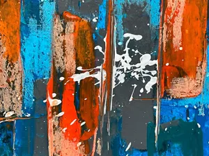 An energetic abstract painting featuring bold splashes of blue, red, and white acrylic paint. jigsaw puzzle