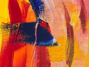 Bright and bold abstract painting with vivid red, yellow, and blue colors in expressive strokes. jigsaw puzzle