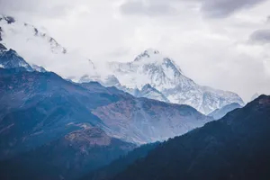 Captivating view of snowy mountain peaks in Ghode Pani, Nepal, showcasing natural beauty. jigsaw puzzle