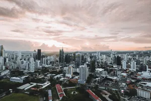 Dramatic aerial view of Panama City skyline during sunset showcasing modern skyscrapers. jigsaw puzzle