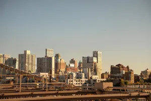 Explore the iconic skyline of New York City captured from Brooklyn Bridge, showcasing urban architecture and vibrant city life. jigsaw puzzle