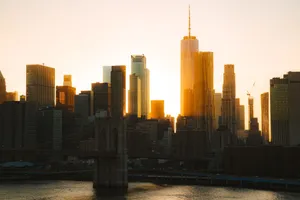 Stunning view of NYC skyline with skyscrapers and Brooklyn Bridge at sunset. jigsaw puzzle