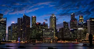 Spectacular view of Singapore's skyline with illuminated skyscrapers against a twilight sky. jigsaw puzzle
