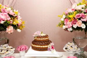 Beautifully decorated cake with vibrant floral arrangements for a special occasion. jigsaw puzzle