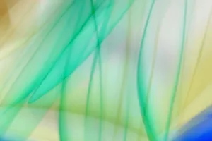 Vibrant abstract image with green and blue light streaks on a gradient background. jigsaw puzzle