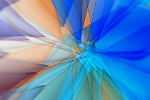 Vivid abstract artwork featuring blue and orange geometric patterns in dynamic motion. jigsaw puzzle