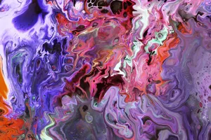 Vibrant abstract fluid art with swirling colors of purple, red, and orange. jigsaw puzzle
