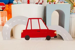 Vibrant car-themed decorations with toy cars and colorful elements creating a festive atmosphere. jigsaw puzzle