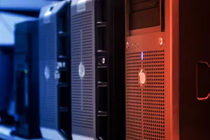 Close-up of tower servers in a data center with blue and red lighting. jigsaw puzzle