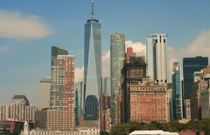 Impressive cityscape of New York City featuring the iconic One World Trade Center amidst modern skyscrapers. jigsaw puzzle