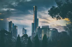 Dramatic view of modern Melbourne skyline at dusk with skyscrapers and stormy clouds. jigsaw puzzle