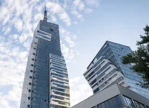 Contemporary skyscrapers reflecting blue sky in Rzeszów, showcasing modern architecture. jigsaw puzzle