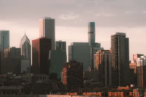 A stunning view of Chicago's skyline at sunset, showcasing iconic skyscrapers and urban architecture. jigsaw puzzle