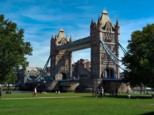 A beautiful view of Tower Bridge in London with people enjoying the sunny day. jigsaw puzzle