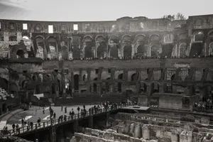Explore the ancient architecture of the Colosseum, bustling with visitors. jigsaw puzzle